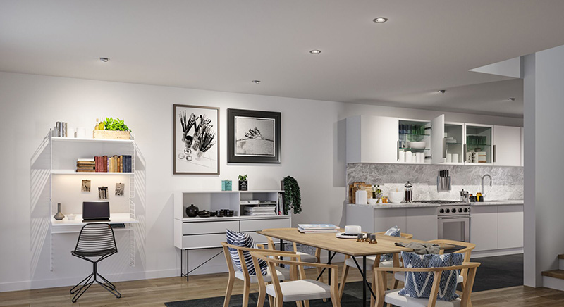 LED-Einbaustrahler im offenen Wohn- und Essbereich mit weisser Küche